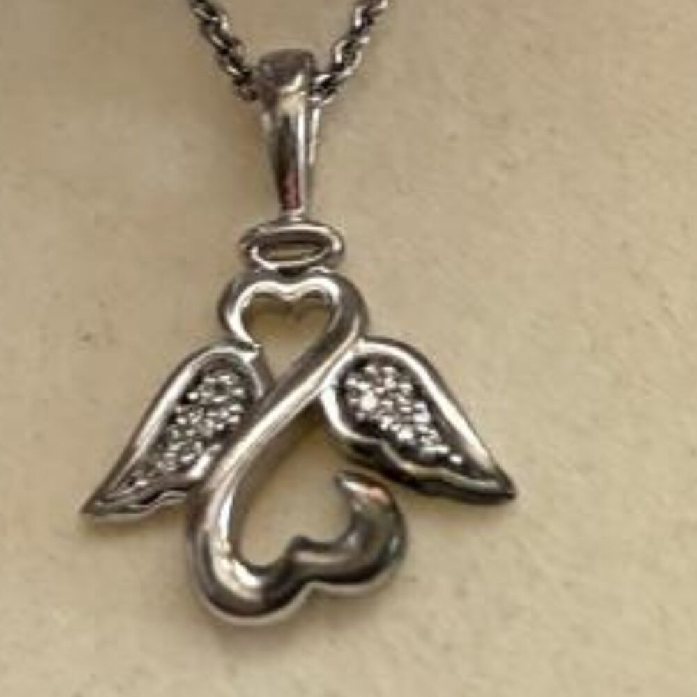 New Jane Seymour Open Hearts Angel Diamond Necklace from Kay Jewelers.